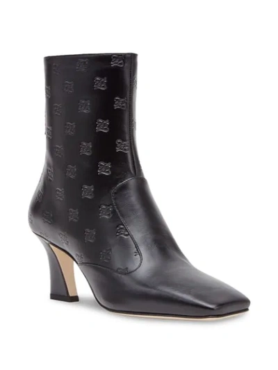 Shop Fendi Logo-embossed Ankle Boots In Black