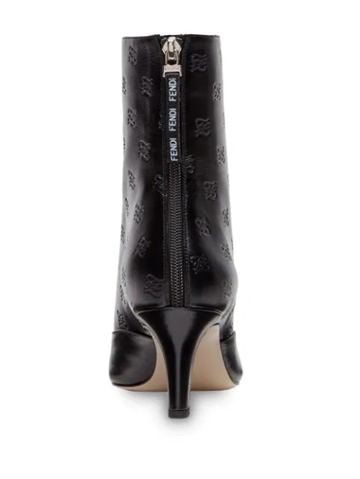 Shop Fendi Logo-embossed Ankle Boots In Black