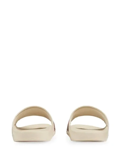 Shop Gucci Gg Flora Pattern Slides In White