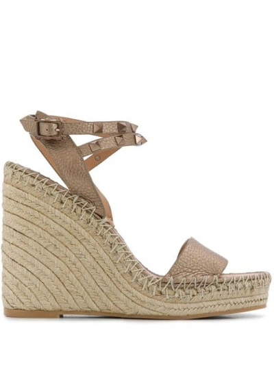 Shop Valentino Rockstud Espadrille Wedge Sandals In Gold