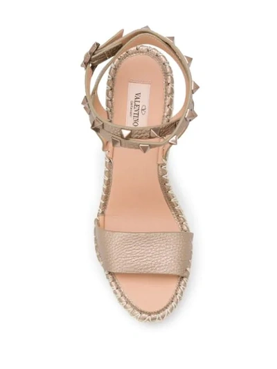 Shop Valentino Rockstud Espadrille Wedge Sandals In Gold