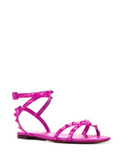 Shop Valentino Rockstud Flair Flat Sandals In Pink