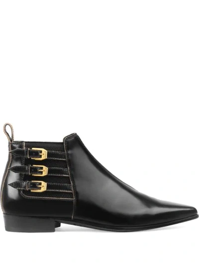 Shop Gucci Buckled Ankle Boots In Black
