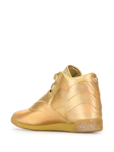 Shop Reebok Freestyle High-top Sneakers In Gold