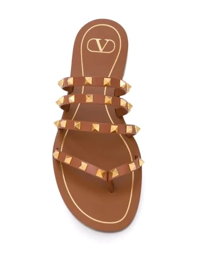 Shop Valentino Rockstud Slip-on Sandals In Brown