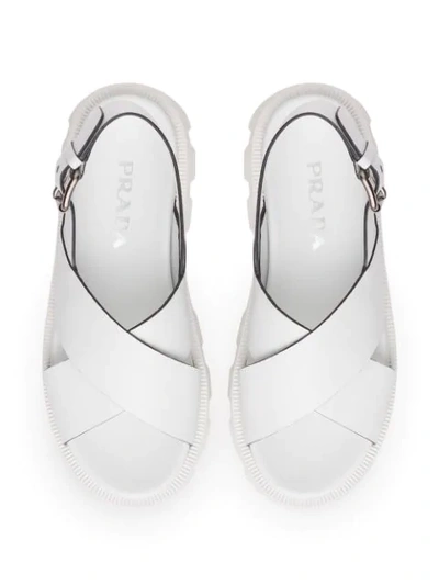 Shop Prada Crossover Strap Sandals In White