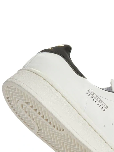 Shop Adidas Originals Superstar Los Angeles Sneakers In White