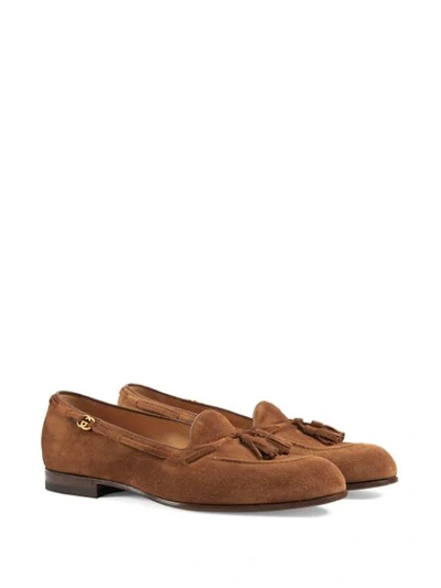 Shop Gucci Suede Tassel Loafers In Brown