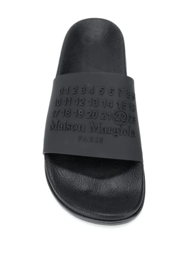 Shop Maison Margiela Logo Embossed Rubber Sliders In Black