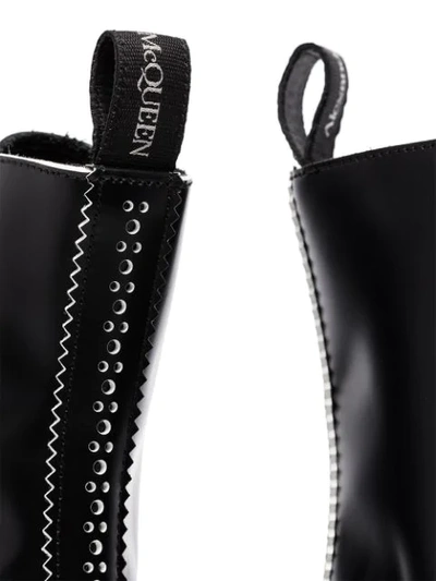 Shop Alexander Mcqueen Contrast-perforation Ankle Boots In Black