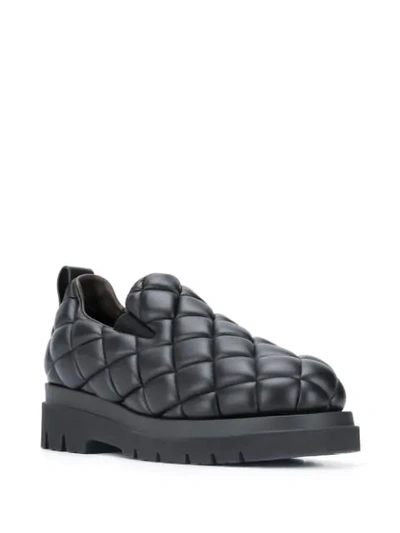 Shop Bottega Veneta Padded Leather Loafers In Black