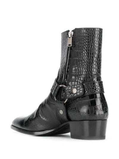 Shop Saint Laurent Wyatt Harness Boots In Black