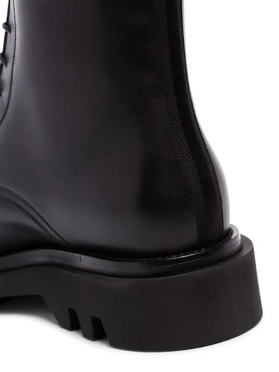 Shop Givenchy Combat Lace-up Ankle Boots In Black
