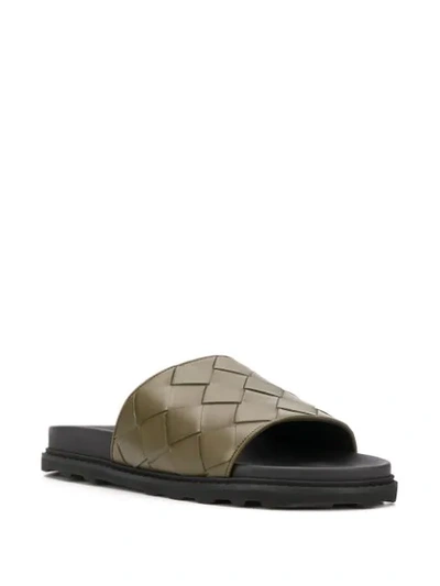 Shop Bottega Veneta Intrecciato Weave Slides In Green