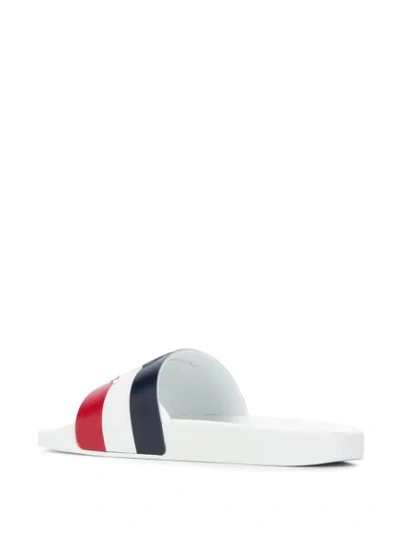 Shop Moncler Striped Slip-on Slides In White