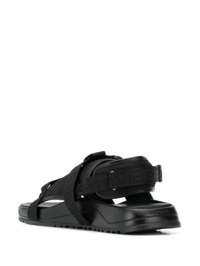Shop Versace Logo-strap Sandals In Black