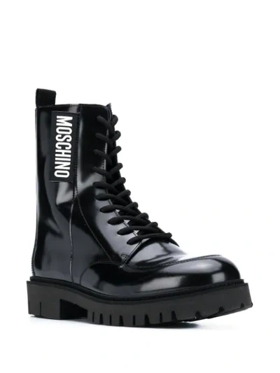Shop Moschino Lace-up Ankle Boots In Black