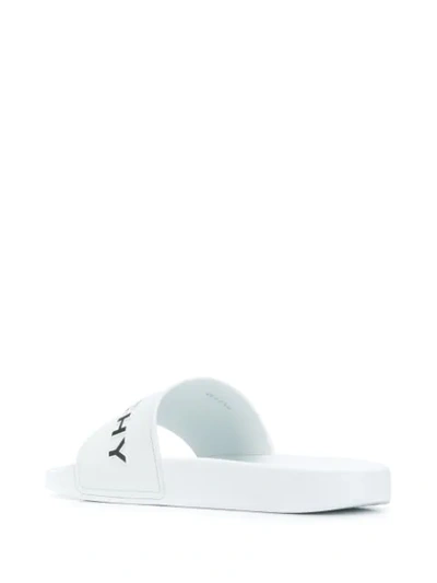 Shop Givenchy Logo-embossed Slides In White