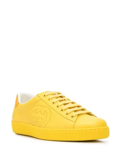 Shop Gucci Perforated Logo Sneakers In Yellow