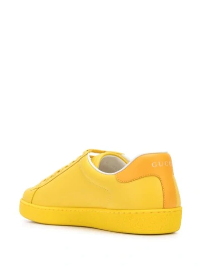 Shop Gucci Perforated Logo Sneakers In Yellow