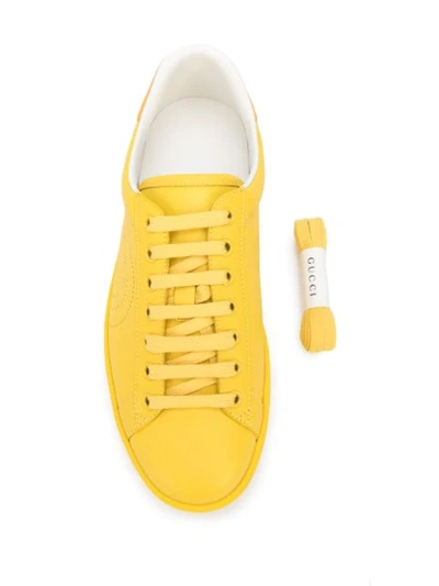 Shop Gucci Perforated Logo Sneakers In Yellow