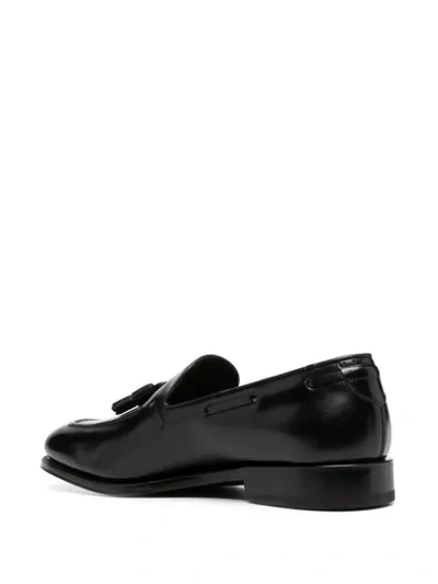 Shop Ferragamo Tassel Detail Loafers In Black