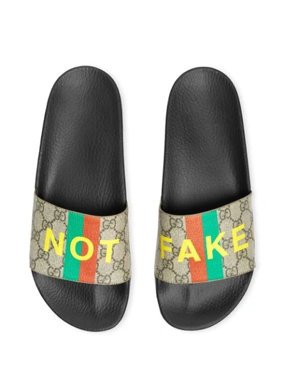 Shop Gucci Fake/not Print Slides In Neutrals