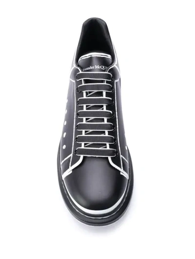 Shop Alexander Mcqueen Oversized Outline Low-top Sneakers In Black