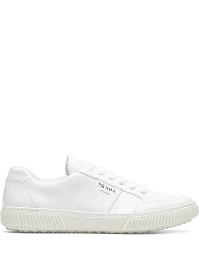 Shop Prada Logo-embossed Lace-up Sneakers In White