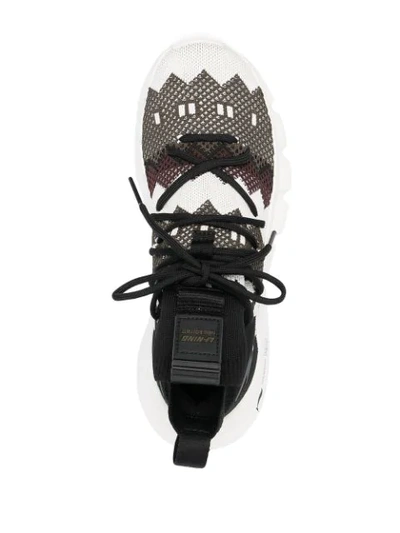 Shop Neil Barrett Geometric-pattern Low-top Sneakers In Black