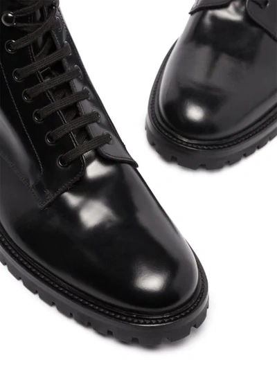 Shop Common Projects Combat Ankle Boots In Black