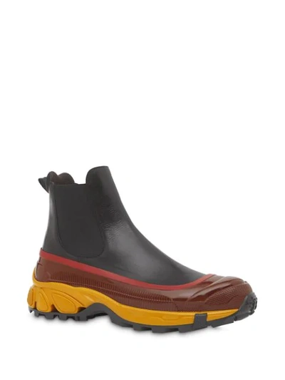 Shop Burberry Contrast Sole Chelsea Boots In Black