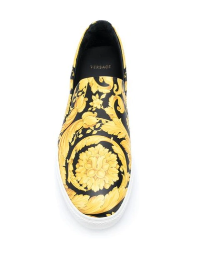 Shop Versace Slip-on Barocco Print Sneakers In Black