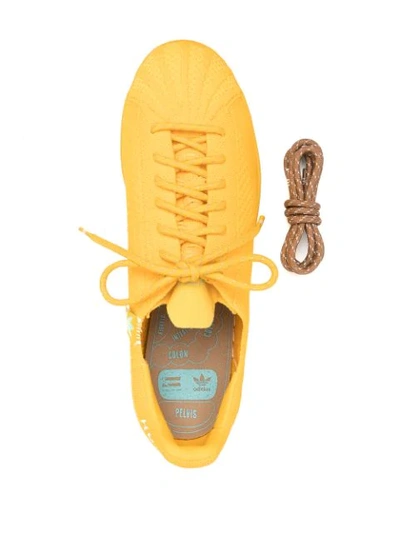 Shop Adidas Originals By Pharrell Williams X Pharrell Williams Superstar Primeknit Lace-up Sneakers In Yellow
