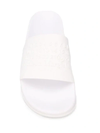 Shop Maison Margiela Embossed Logo Pool Slides In White