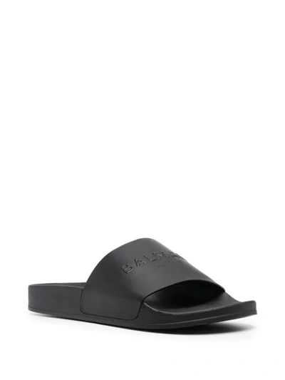 Shop Balmain Logo Embossed Slides In Noir