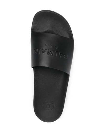 Shop Balmain Logo Embossed Slides In Noir