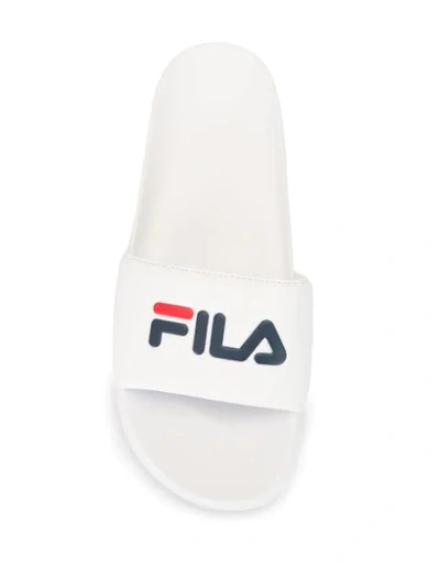 Shop Fila Logo Print Embossed Side Slides In White