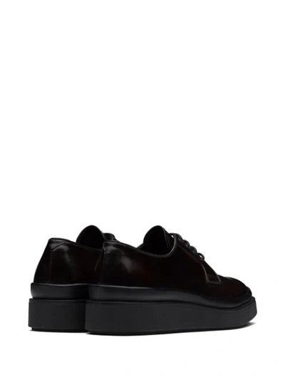 Shop Prada Leather Derby Shoes In Brown