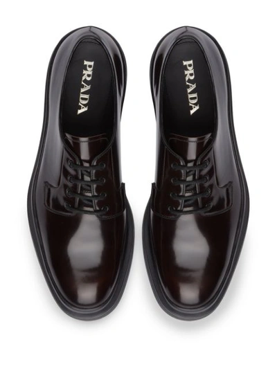 Shop Prada Leather Derby Shoes In Brown