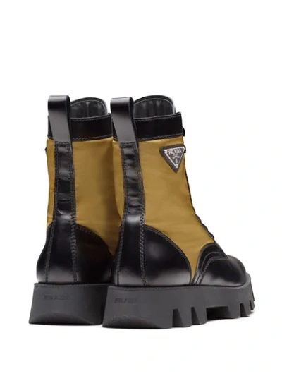 Shop Prada Panelled Combat Boots In Black