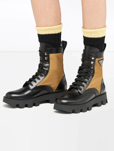 Shop Prada Panelled Combat Boots In Black