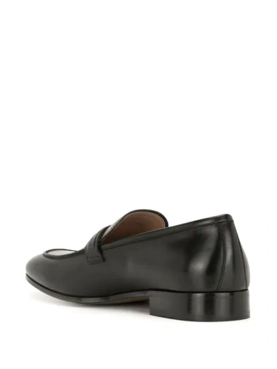 Shop Ferragamo Buckle-fastening Leather Loafers In Black