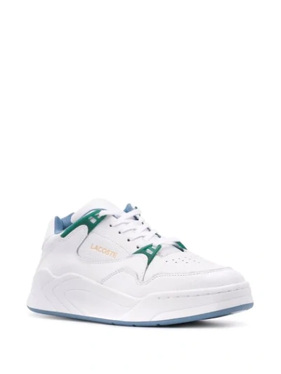 Shop Lacoste Court Slam Lace-up Sneakers In White