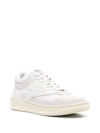 Shop Autry Mid-top Logo Detail Sneakers In White