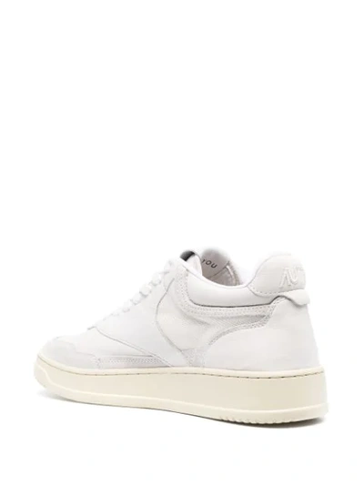 Shop Autry Mid-top Logo Detail Sneakers In White