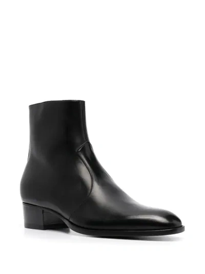 Shop Saint Laurent Wyatt Zipped Boots In Black