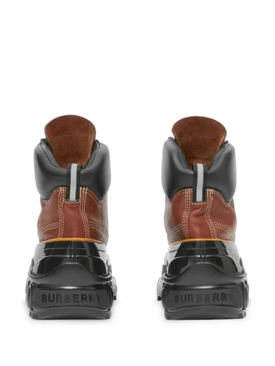 Shop Burberry Contrast-sole Ankle Boots In Brown