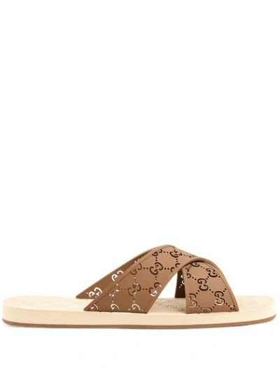Shop Gucci Gg Slide Sandals In Brown