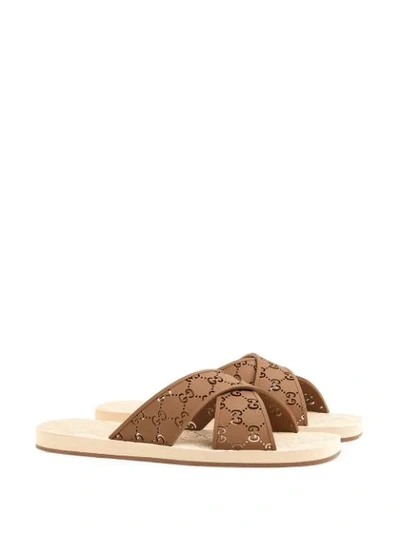 Shop Gucci Gg Slide Sandals In Brown